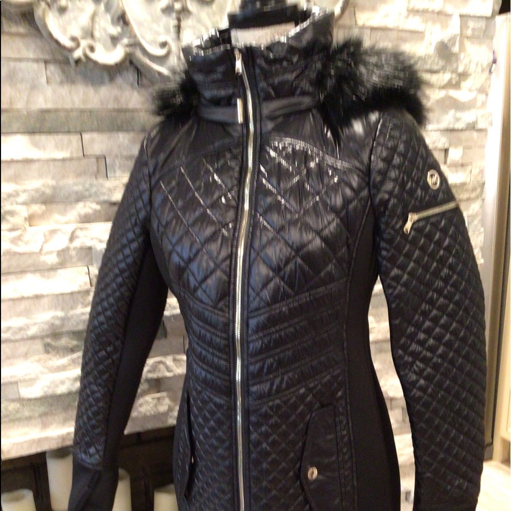 Micheal kors black quilted coat new with out tags